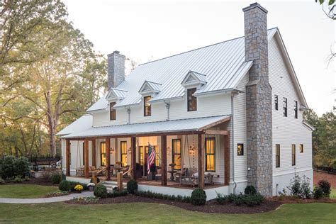 two story house with metal roof